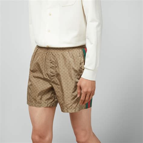 Waterproof nylon swim shorts with GG in camel